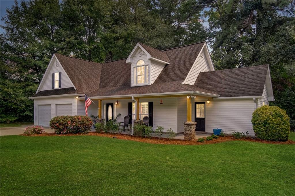 159 Sequoyah Circle Canton, GA 30115 - Photo 1 of 1 a front view of a house with a garden