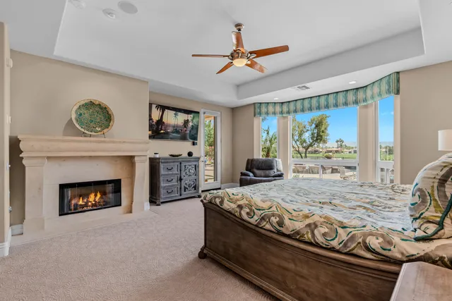 a large bathroom with a large tub and sink