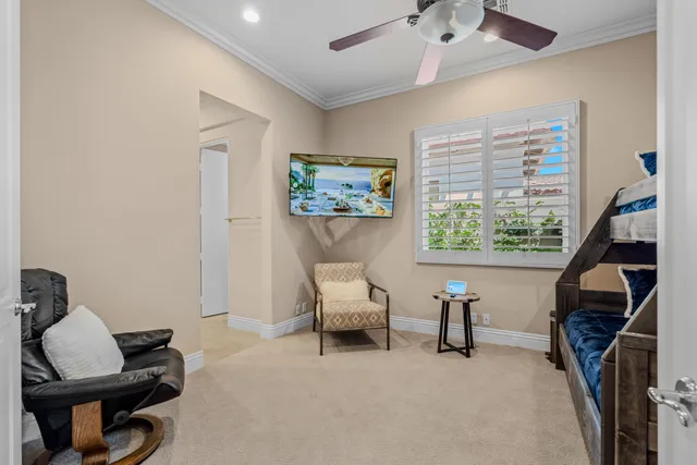 a building outdoor space with patio furniture and potted plants