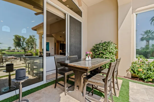 a view of a swimming pool with a garden