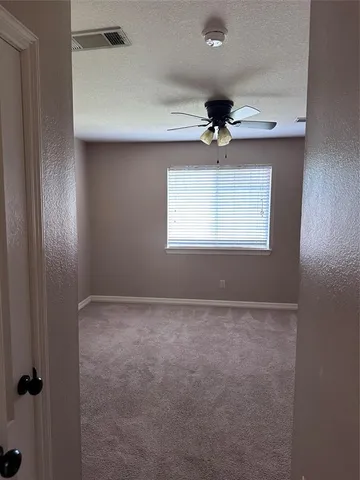 a bathroom with a toilet a sink and bathtub