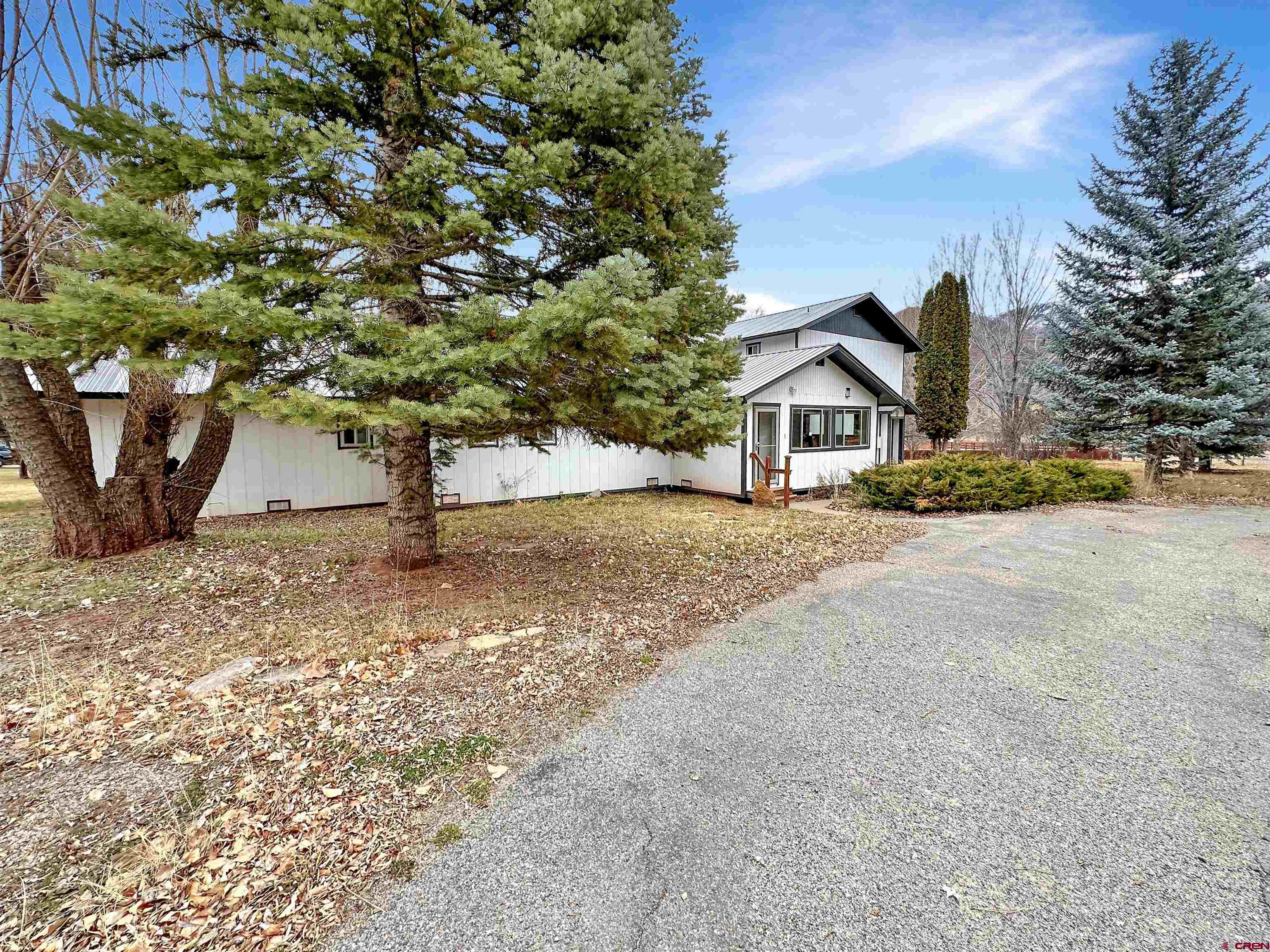 6644 County Road 203 Durango, CO 81301 - Photo 4 of 21 a house with a yard