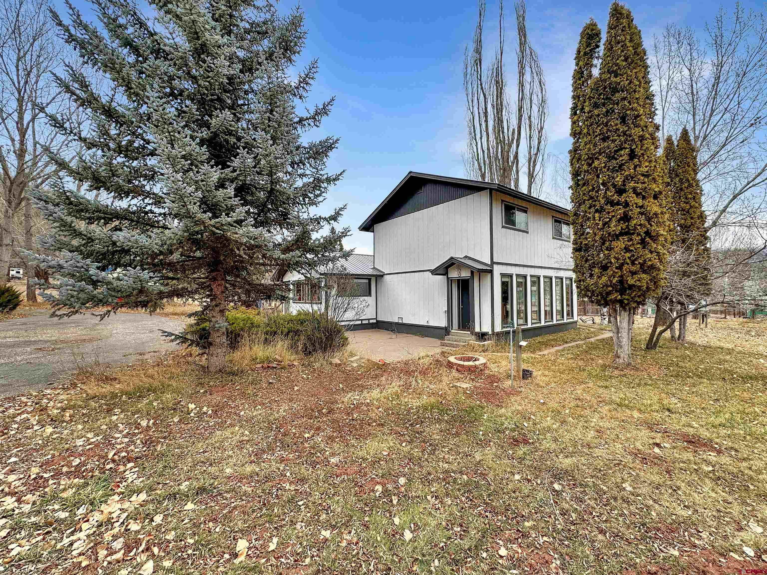 6644 County Road 203 Durango, CO 81301 - Photo 8 of 21 a view of a house with a yard