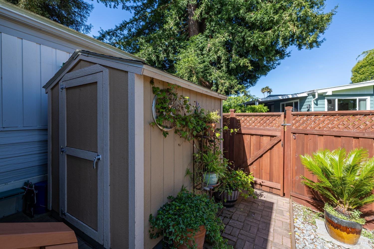 29 Hemlock Court Rohnert Park, CA 94928 - Photo 25 of 28 Storage shed & rear gate to community path