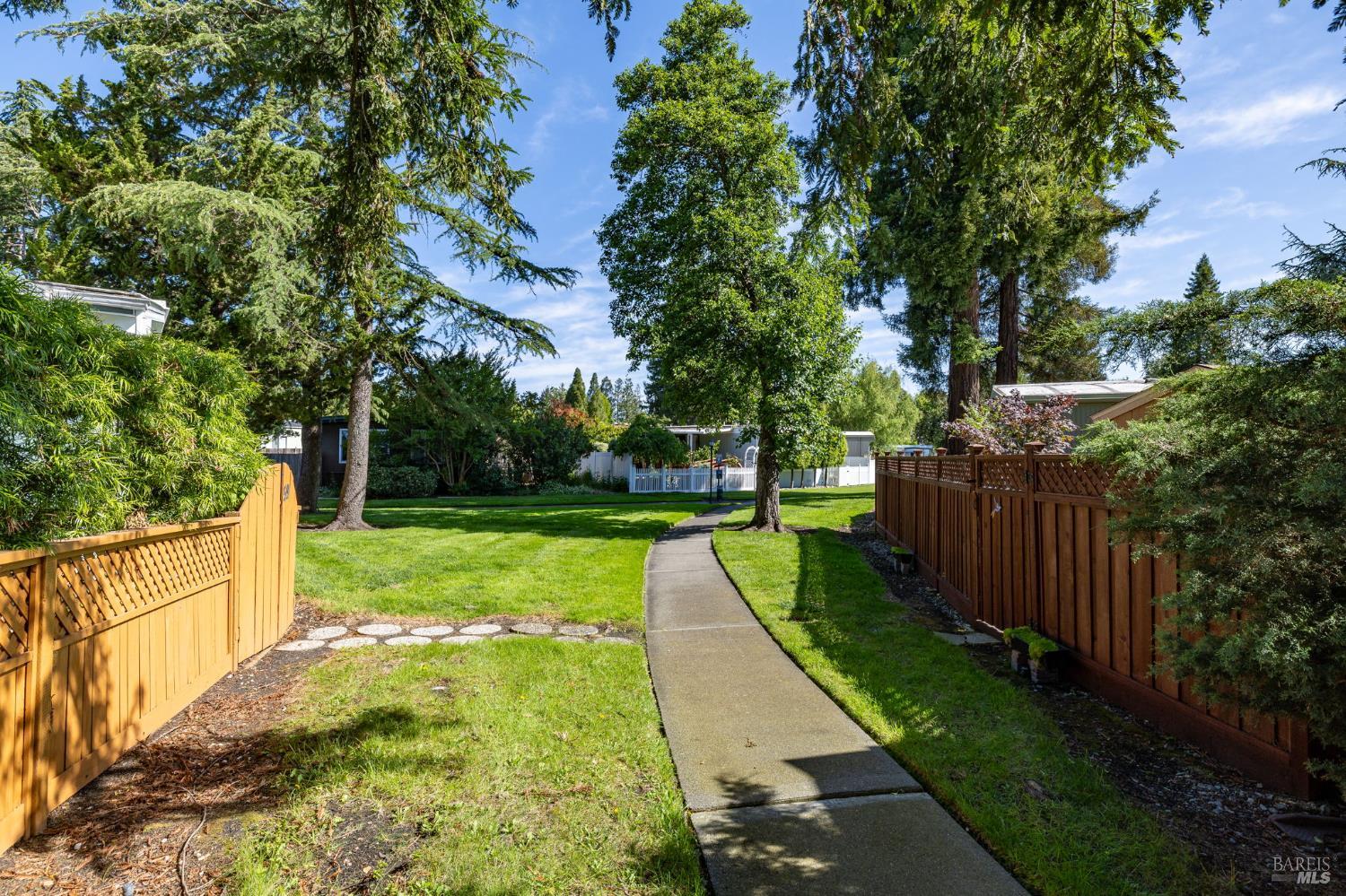 29 Hemlock Court Rohnert Park, CA 94928 - Photo 28 of 28 Community path behind home / rear gate to right