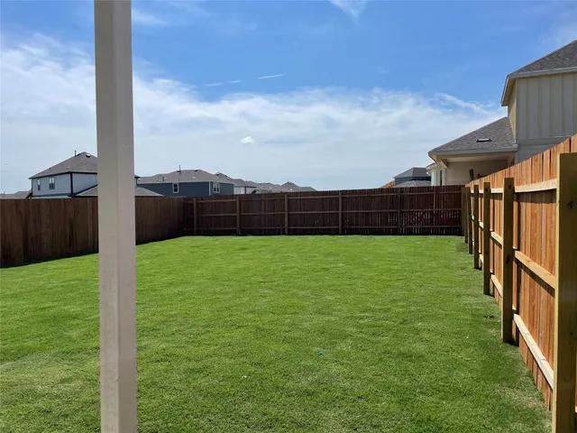 a view of yard with porch