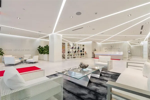 a workspace with furniture and window