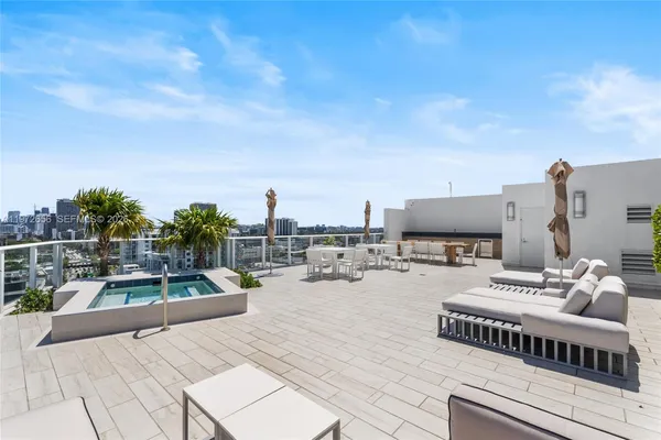 a view of a terrace with chairs