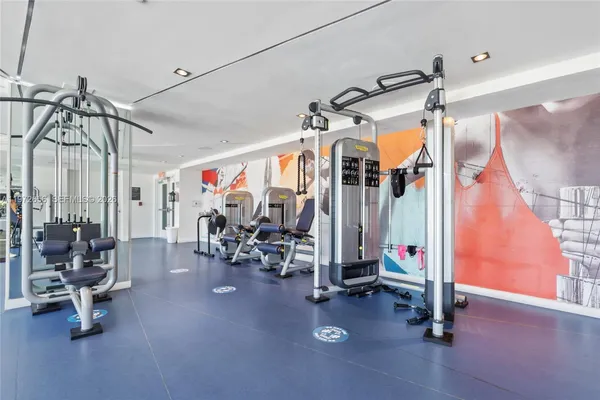 a view of a room with gym equipment