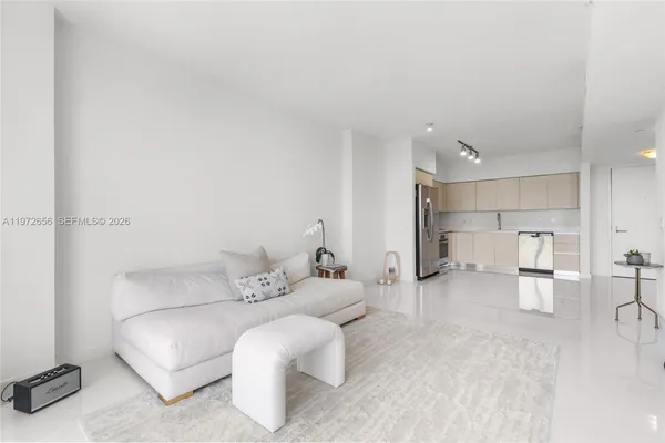 a living room with furniture and a couch