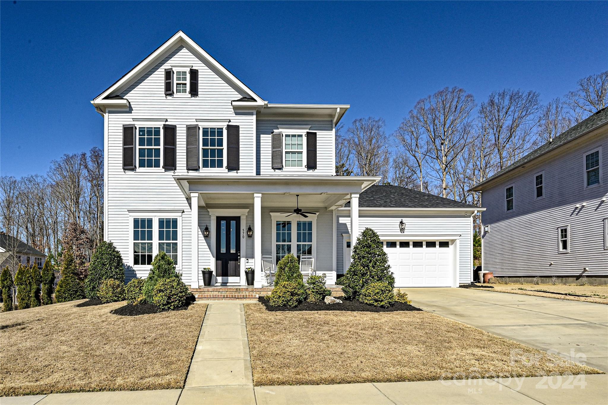 570 Crawfish Drive Fort Mill, SC 29708 - Photo 1 of 37 a front view of a house with garden