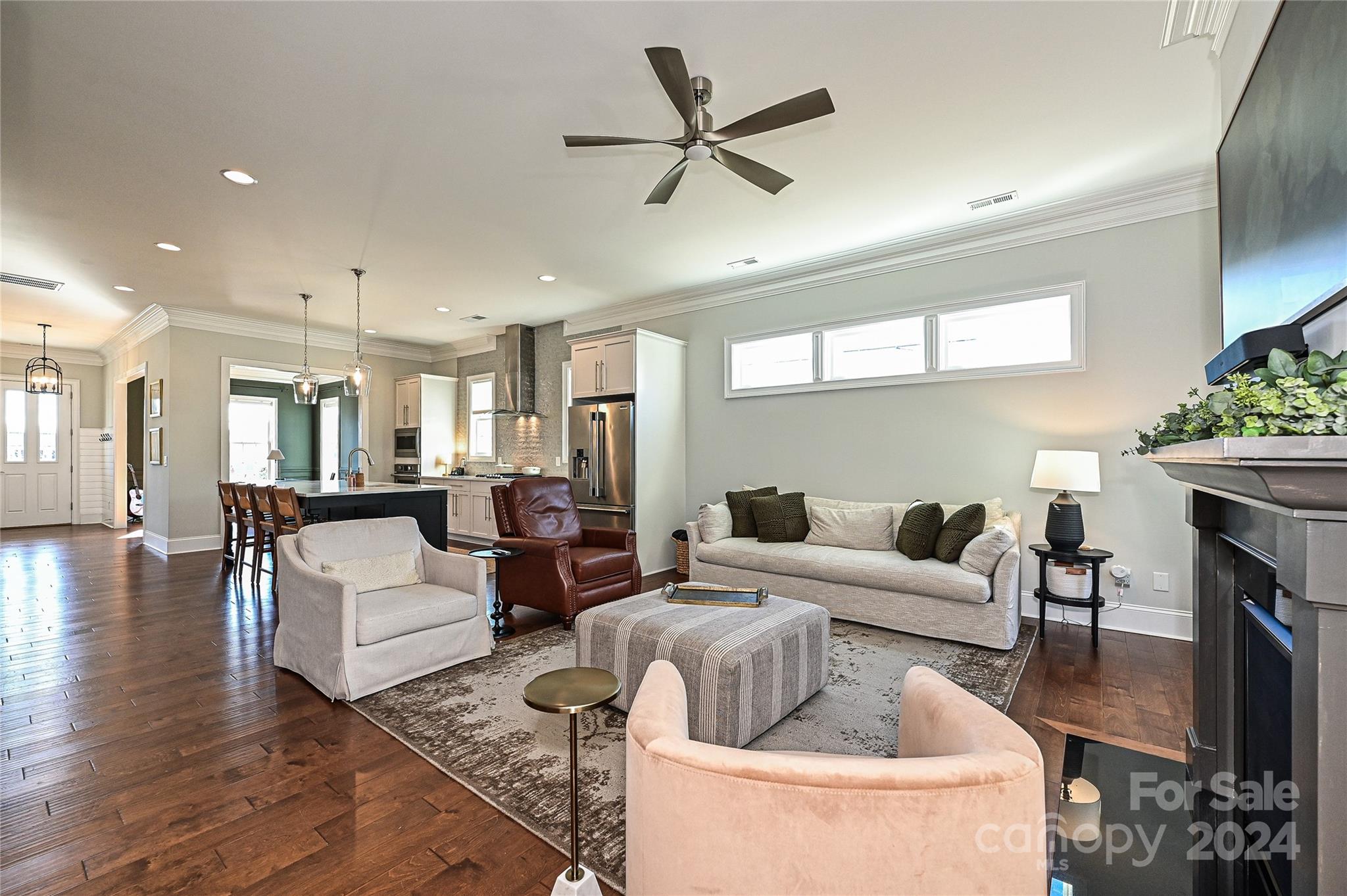 570 Crawfish Drive Fort Mill, SC 29708 - Photo 13 of 37 a living room with fireplace furniture and a wooden floor