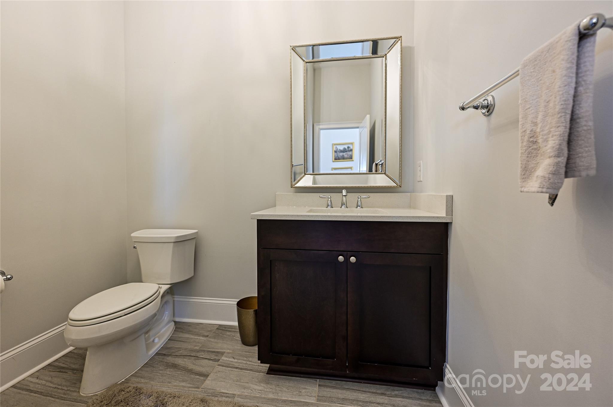 570 Crawfish Drive Fort Mill, SC 29708 - Photo 21 of 37 a bathroom with a toilet sink and mirror