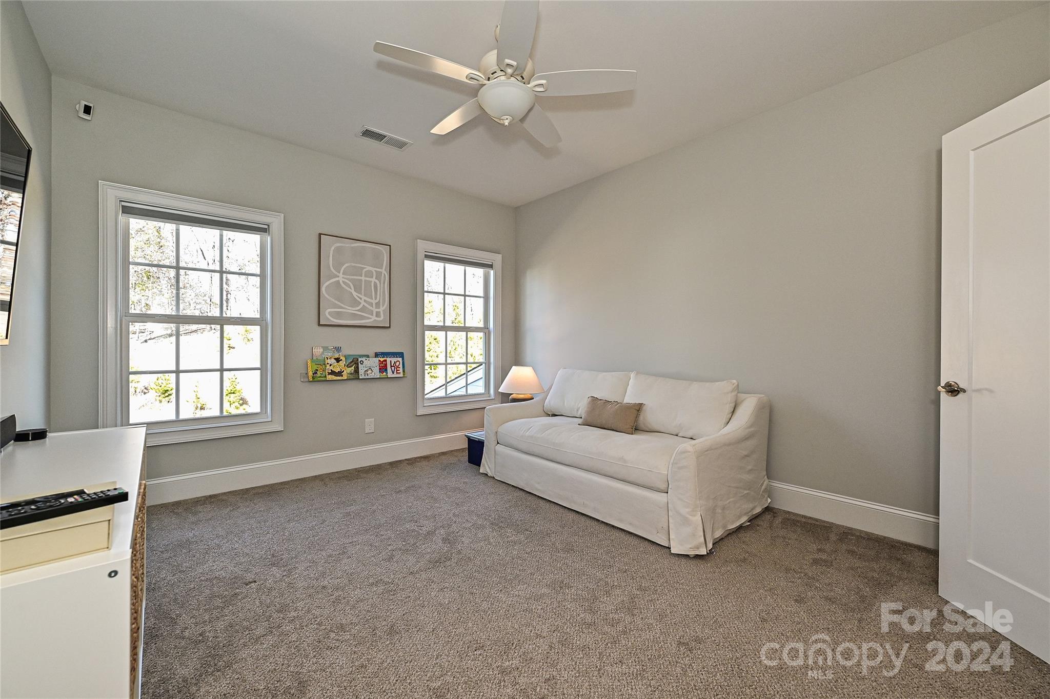 570 Crawfish Drive Fort Mill, SC 29708 - Photo 23 of 37 a living room with furniture and windows