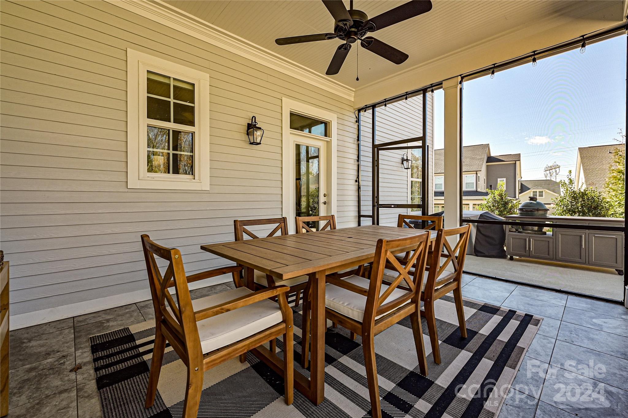 570 Crawfish Drive Fort Mill, SC 29708 - Photo 33 of 37 a view of a patio with a table and chairs