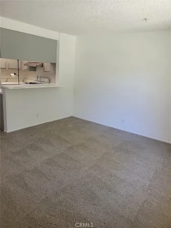 a view of a kitchen with a sink