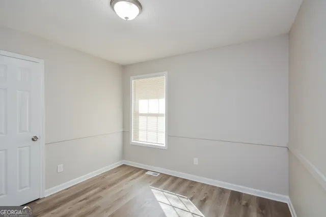 an empty room with windows