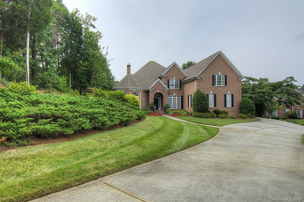 3237 Planters Ridge Road Charlotte, NC 28270 - Photo 2 of 24 a front view of a house with a yard