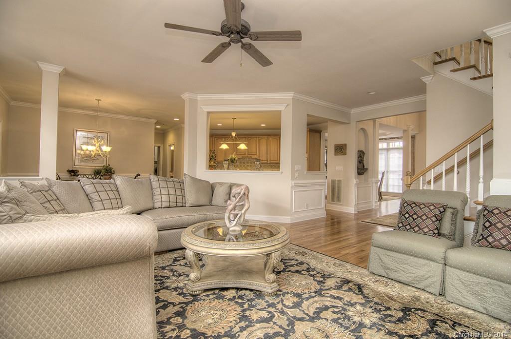 3237 Planters Ridge Road Charlotte, NC 28270 - Photo 11 of 24 a living room with furniture and a wooden floor