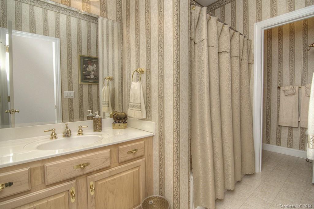 3237 Planters Ridge Road Charlotte, NC 28270 - Photo 19 of 24 a bathroom with a double vanity sink and a mirror