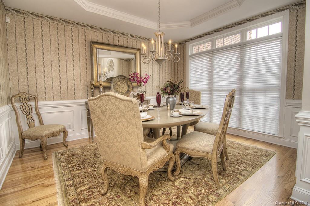 3237 Planters Ridge Road Charlotte, NC 28270 - Photo 5 of 24 a view of a dining room with furniture and a window