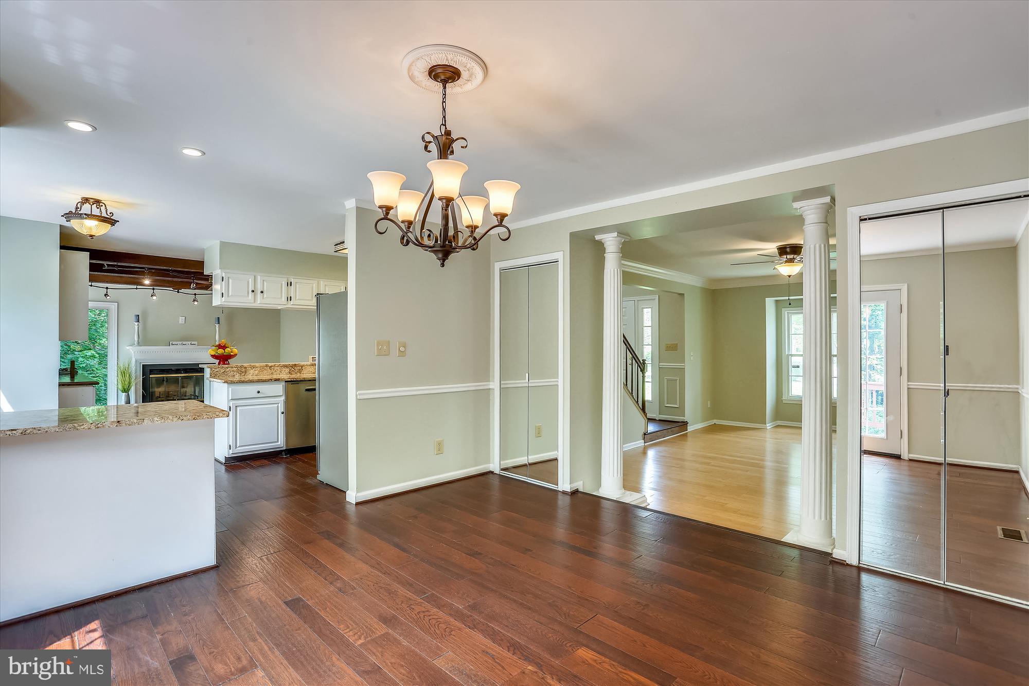 8908 Spring Berry Court Gaithersburg, MD 20886 - Photo 10 of 59 Dining Room with hardwood floors and built-ins