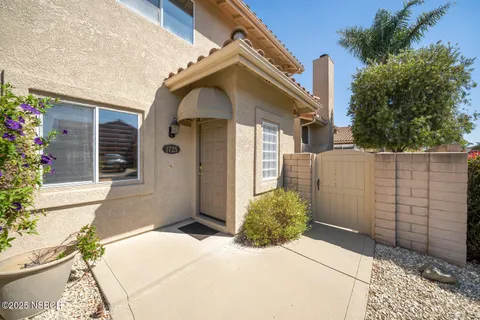a front view of a house with a garage