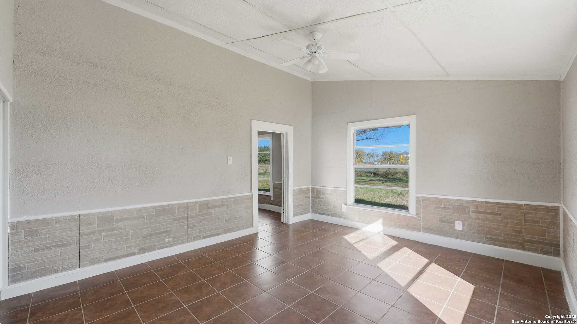 13895 Wisdom Road Atascosa, TX 78002 - Photo 14 of 48 a view of an empty room with a window