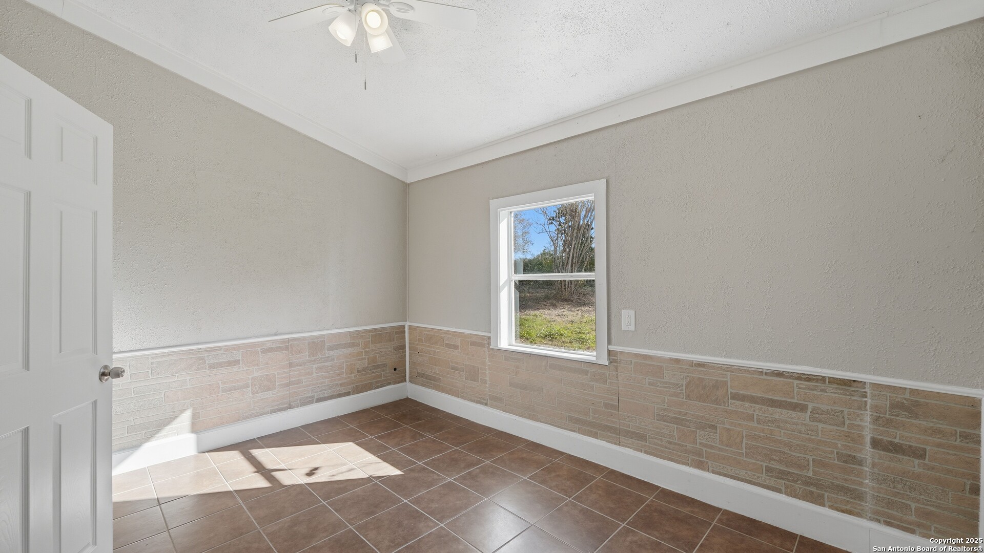 13895 Wisdom Road Atascosa, TX 78002 - Photo 16 of 48 a view of an empty room with a window