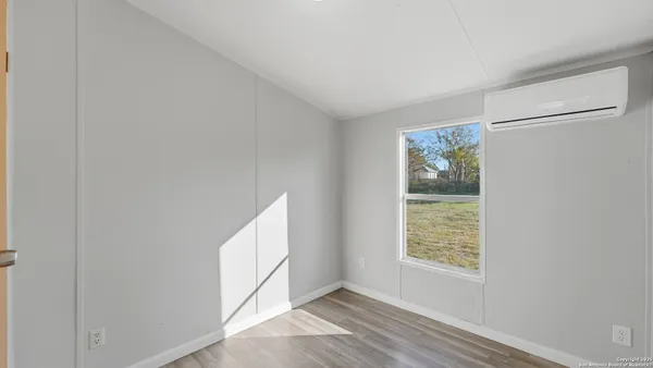 a view of the back yard of the house