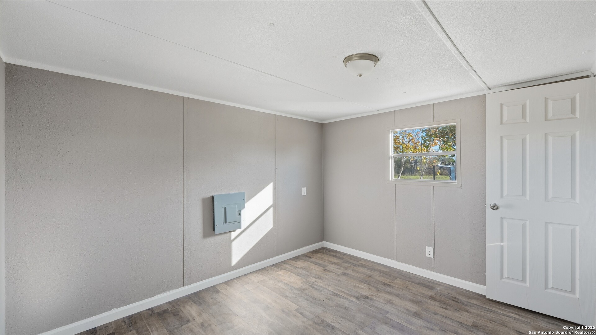 13895 Wisdom Road Atascosa, TX 78002 - Photo 40 of 48 an empty room with windows and closet