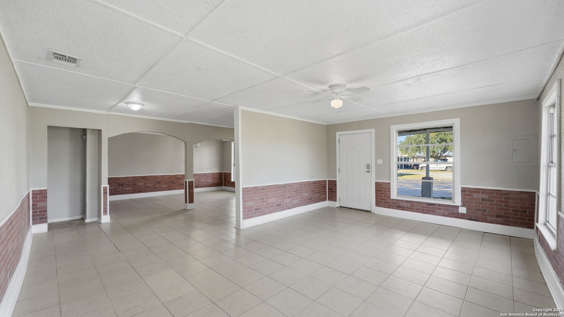 13895 Wisdom Road Atascosa, TX 78002 - Photo 4 of 48 a view of livingroom with an open space and window