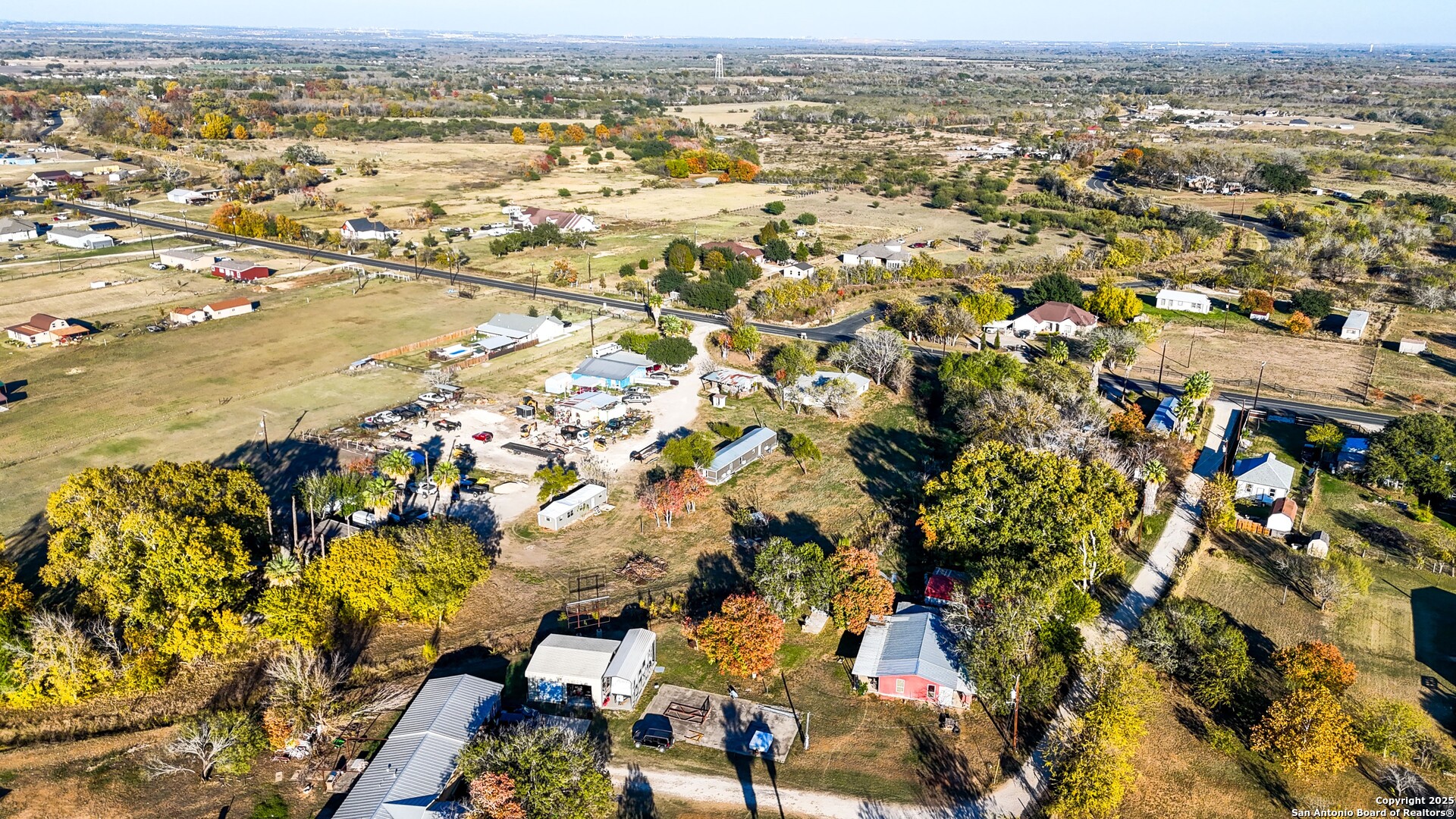 13895 Wisdom Road Atascosa, TX 78002 - Photo 48 of 48 an aerial view of residential building with parking space