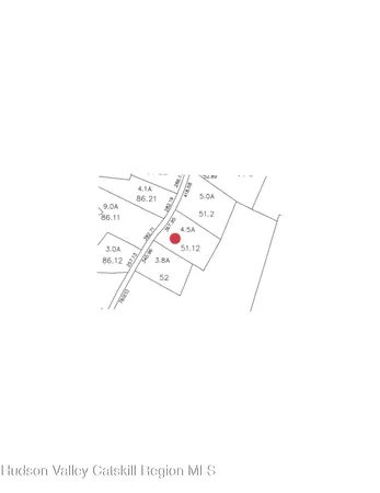 a view of a road with a yard