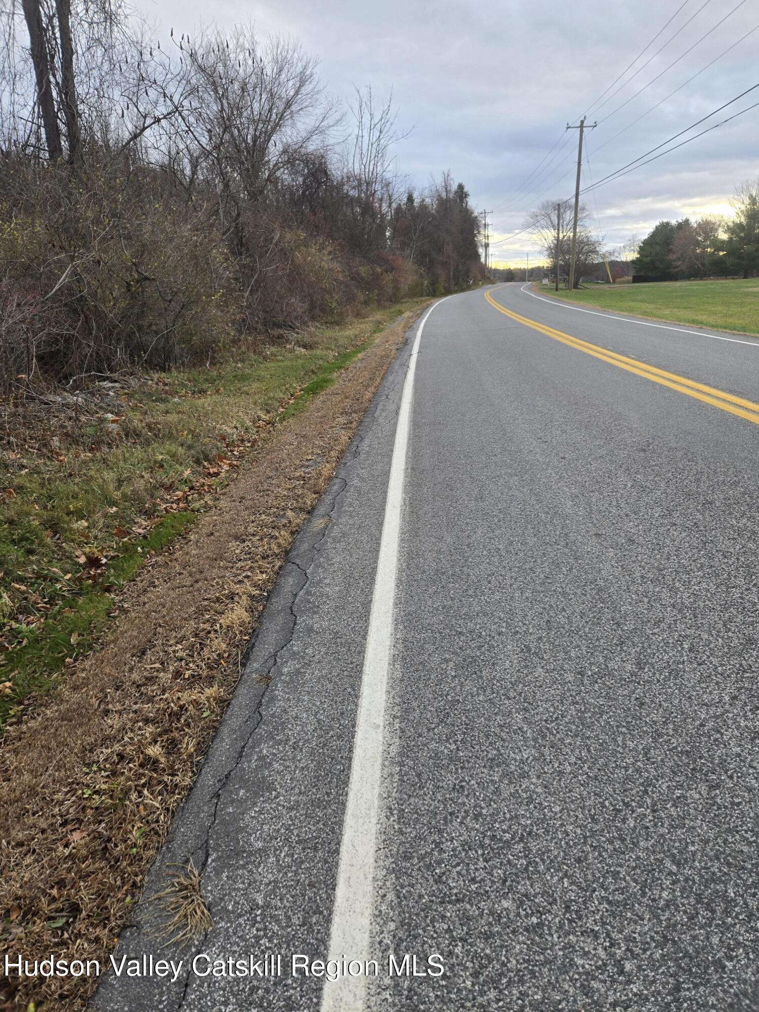 0 Farm Road Copake, NY 12516 - Photo 2 of 4 a view of a road with a yard