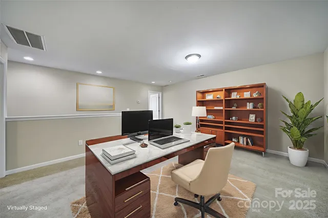 a view of a workspace with furniture