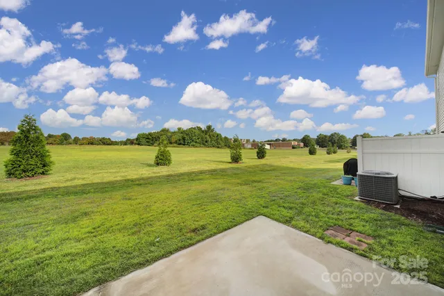 a view of a golf course with a lake