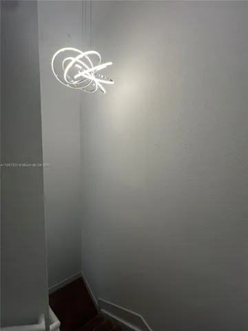 a bathroom with a double vanity sink toilet and shower