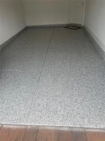a view of a livingroom with a ceiling fan a ceiling fan and wooden floor