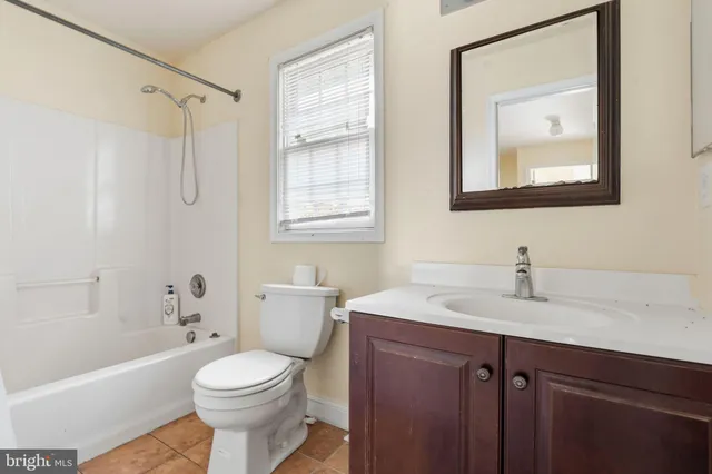 a picture of a room with a white wall and sign