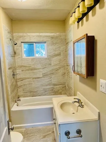 a bathroom with a sink and a tub