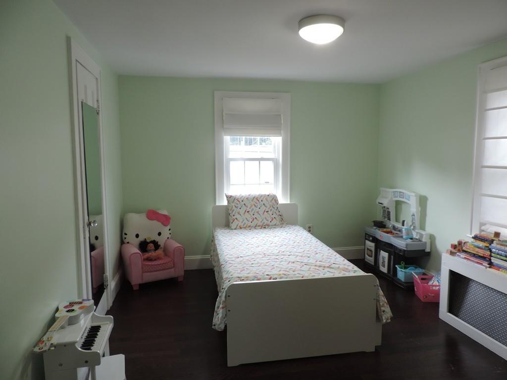 24 Partridge Road Weymouth, MA 02190 - Photo 13 of 24 a bedroom with a bed and a window