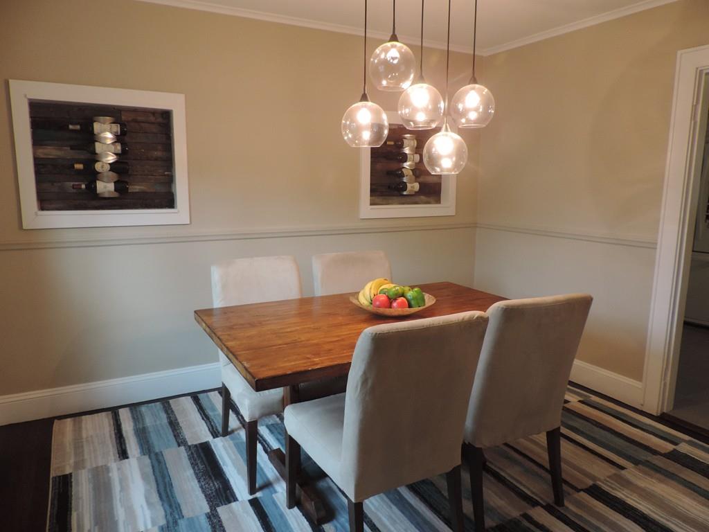 24 Partridge Road Weymouth, MA 02190 - Photo 7 of 24 a view of a dining room with furniture and chandelier