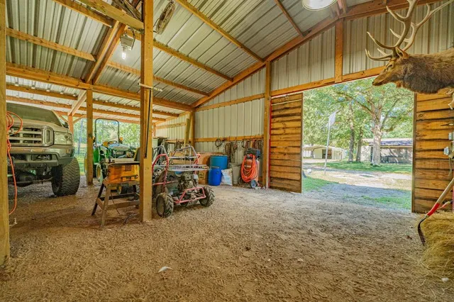 a view of a garage with chairs