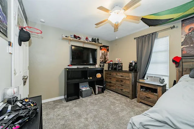 a view of a livingroom with space and a window