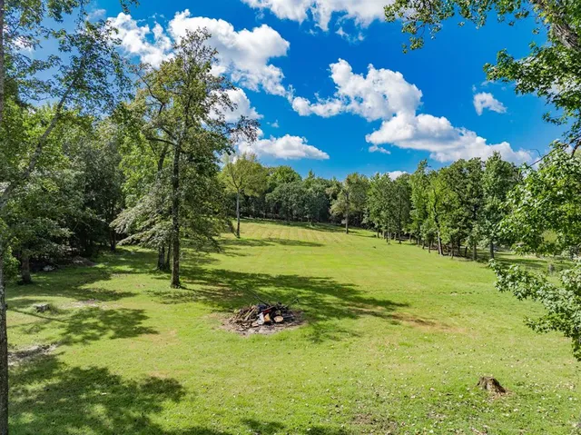 a view of a golf course with a lake