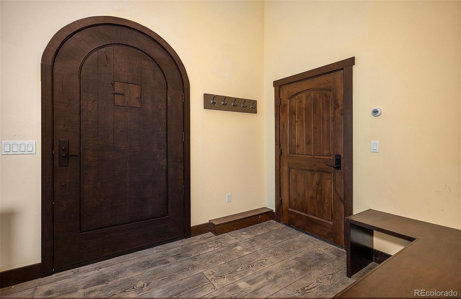 602 Spruce Street Red Cliff, CO 81649 - Photo 24 of 44 a view of entryway with wooden floor