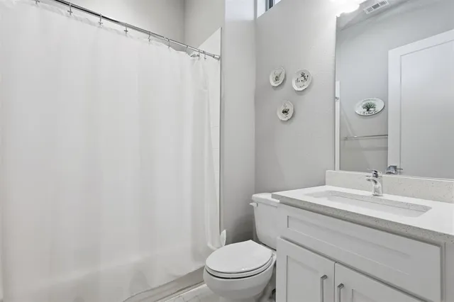 a view of balcony with floor to ceiling window and wooden floor