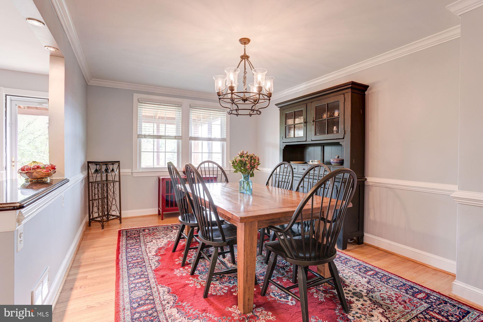 417 Whitfield Road Baltimore, MD 21228 - Photo 11 of 31 a view of a a dining room with furniture window and wooden floor