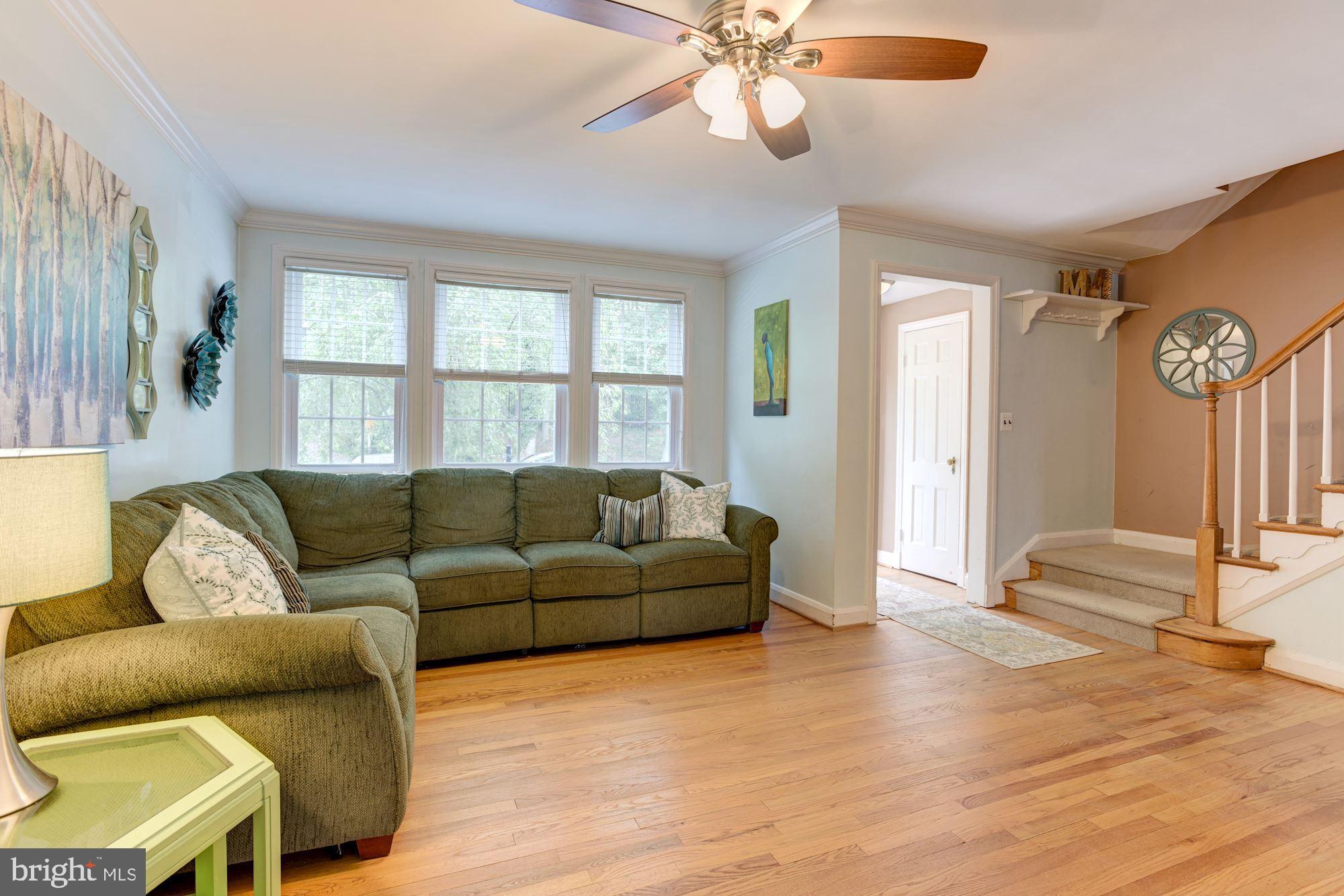 417 Whitfield Road Baltimore, MD 21228 - Photo 5 of 31 a living room with furniture and a large window